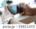 businessman hands searching for data on Notebook 59921455