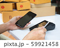 businessman hand using the card machine to pay the 59921458