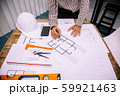 Close-up hand of male Architect drawing blueprint 59921463