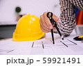 Engineer man and Architect drawings blueprint at 59921491
