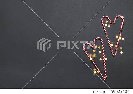 Happy holidays greeting card with candy cane in a 59925186