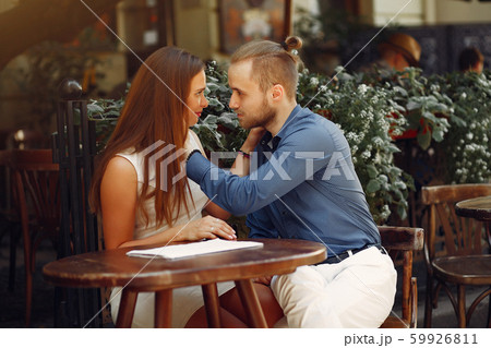 Beautiful couple spend time in a summer city 59926811