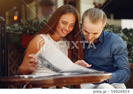Beautiful couple spend time in a summer city Beautiful couple spend time in a summer city 59926854