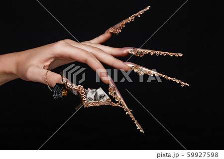 Creative design of nails on female hands. Art manicure. 59927598