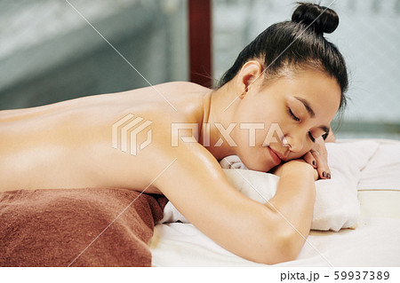 Woman sleeping in spa salon 59937389