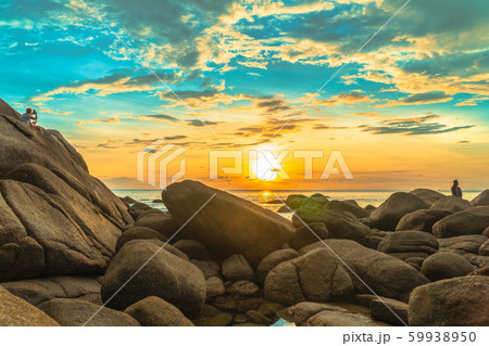 The yellow sunset in the blue sky 59938950
