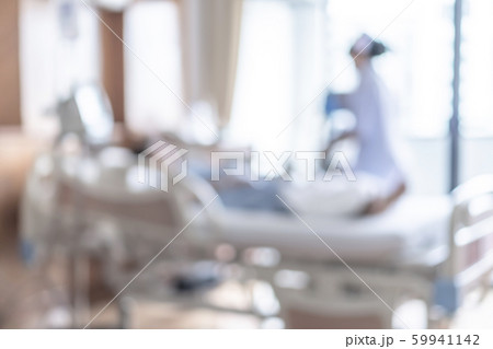Nurse nursing patient on hospital bed blur background, medical blurry interior white room ward with hospital health care service or healthcare recovery treatment Nurse nursing patient on hospital bed blur background, medical blurry interior white room ward with hospital health care service or healthcare recovery treatment 59941142