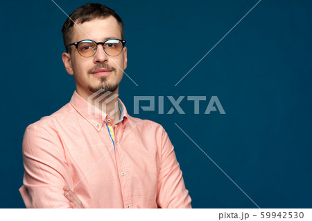 Confident man with mustache wearing tinted glasses 59942530
