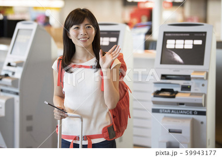 空港 チェックイン 女性 空港 チェックイン 女性 59943177