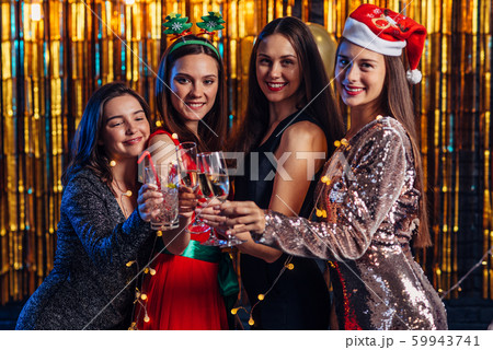Group of friends celebrating, Christmas party, New Year 59943741
