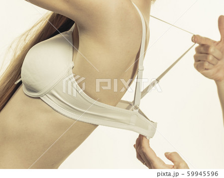 Female wearing too big bra - Stock Photo [66844424] - PIXTA