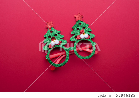 Funny eyeglasses in the form of Christmas tree Funny eyeglasses in the form of Christmas tree 59946135