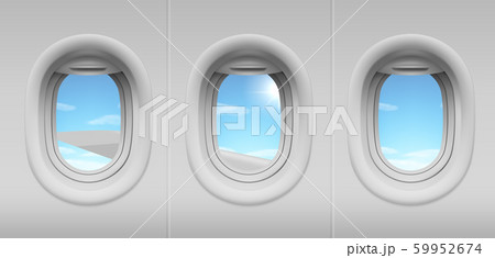 Airplane portholes with sky and wing view 59952674