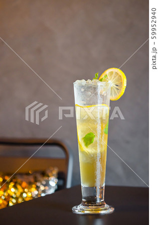 Mojito cocktail with lime and mint in high glass. 59952940