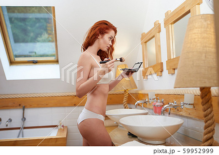 Beauty woman applying makeup. Beautiful girl Beauty woman applying makeup. Beautiful girl 59952999