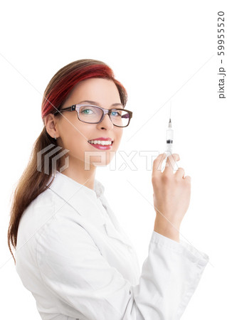 Beautiful smiling female doctor with a syringe Beautiful smiling female doctor with a syringe 59955520