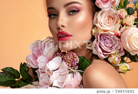 Beautiful white girl with flowers. Stunning Beautiful white girl with flowers. Stunning 59955692