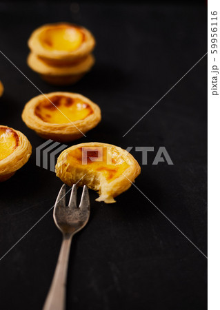 Egg tart dessert on the table. Egg tart dessert on the table. 59956116