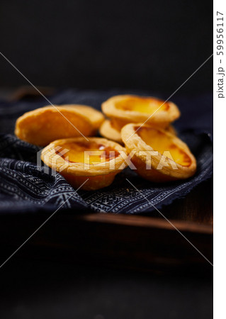 Egg tart dessert on the table. Egg tart dessert on the table. 59956117
