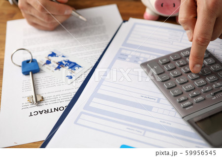 Male agent working with paperwork 59956545