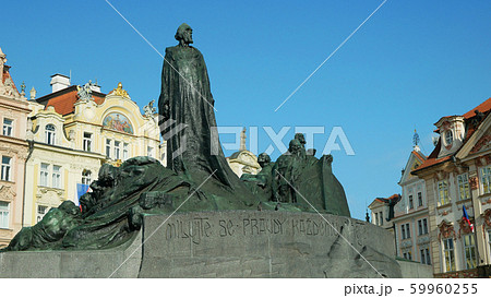 Jan Hus Memorial Old Town Square stands In Prague, statue of bronze stone depicts victorious Hussite warriors heroes or protestants, Historic, Artistic Art Nouveau architecture landmark, built 1915 Jan Hus Memorial Old Town Square stands In Prague, statue of bronze stone depicts victorious Hussite warriors heroes or protestants, Historic, Artistic Art Nouveau architecture landmark, built 1915 59960255