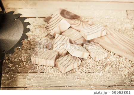 pieces of wood with saw blade on the boards background 59962801