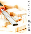 pieces of wood with chisel on the boards background 59962803
