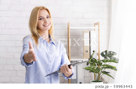 Friendly woman psychologist reaching hand for handshake 59963443