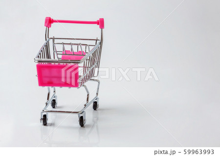 Small supermarket grocery toy push cart on white Small supermarket grocery toy push cart on white 59963993