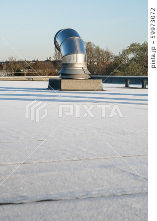Chimney on the frozen roof 59973072