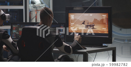 Man controlling Mars rover with remote controller 59982782