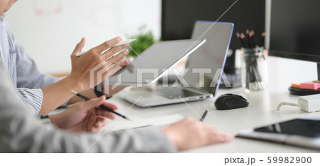 Cropped shot of UX web developer team working on 59982900