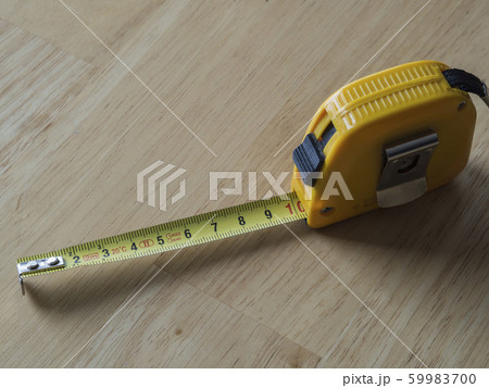 yellow measuring tape measure showing ten 59983700