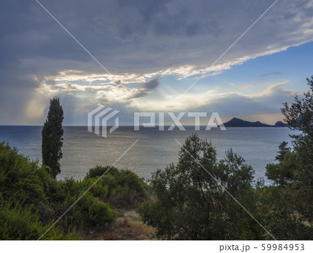 green tropical vegetation sea and sky with green tropical vegetation sea and sky with 59984953