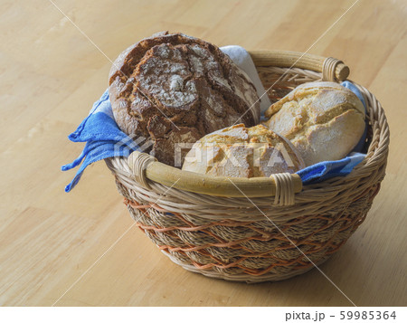 bread basket with fresh bread and bagels with blue bread basket with fresh bread and bagels with blue 59985364