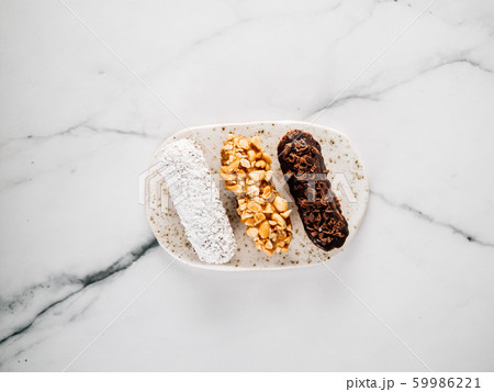 Healthy eclairs or profitroles on marble background 59986221