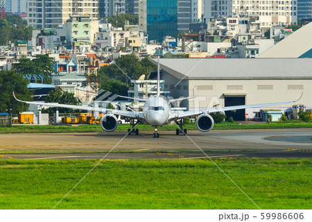 Airplane at Saigon Airport, Vietnam Airplane at Saigon Airport, Vietnam 59986606