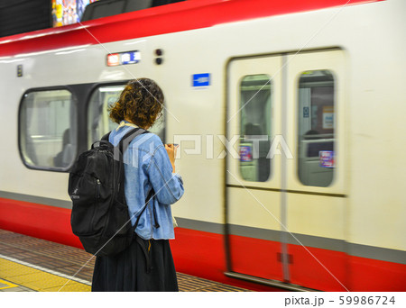 Passengers waiting for the train at JR Station 59986724
