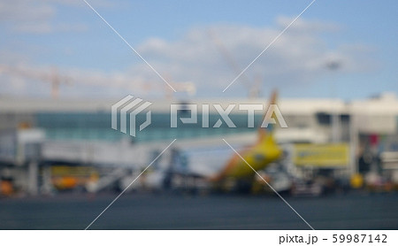 Blurred airport with airplanes on runway Blurred airport with airplanes on runway 59987142