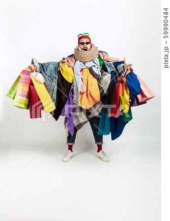 Man addicted of sales and clothes, overproduction and crazy demand Man addicted of sales and clothes, overproduction and crazy demand 59990484