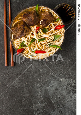 Asian beef noodle soup with chilli Asian beef noodle soup with chilli 59998250