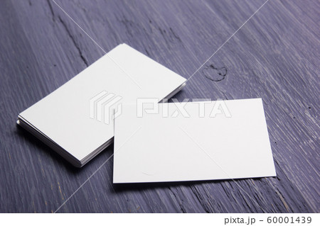 Business card blank on wooden background. Corporate Stationery, Branding Mock-up. Creative designer desk. Flat lay. Copy space for text Business card blank on wooden background. Corporate Stationery, Branding Mock-up. Creative designer desk. Flat lay. Copy space for text 60001439