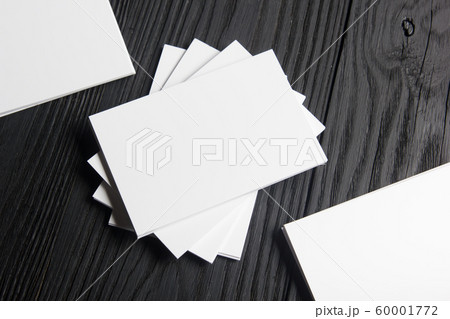 Business card blank on wooden background. Corporate Stationery, Branding Mock-up. Creative designer desk. Flat lay. Copy space for text 60001772