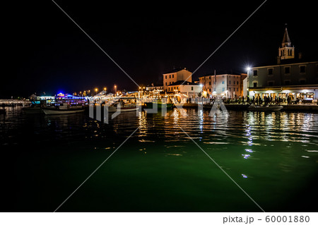 Illuminated Village Fazana In Croatia In The Night With Old Church And Boats In Harbor 60001880