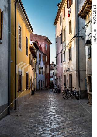 Abandoned Narrow Street With Old Houses And Bicycles In Fazana Croatia Abandoned Narrow Street With Old Houses And Bicycles In Fazana Croatia 60001931
