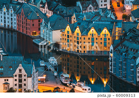 Alesund, Norway. Night View Of Alesund Skyline Cityscape. Historical Center In Summer Evening. Famous Norwegian Landmarks And Popular Destination 60009313