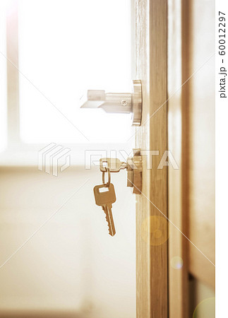 Door lock , door open in front of room blur background 60012297