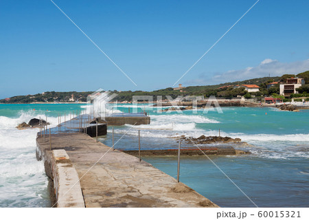 Beautiful azure sea and the rocky beach 60015321