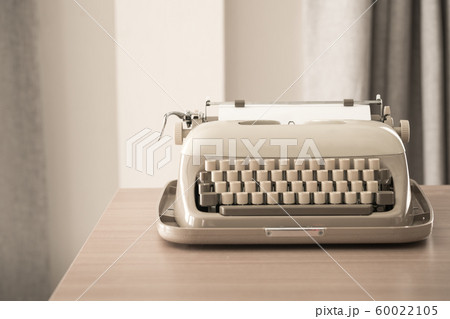 Retro style typewriter in studio Retro style typewriter in studio 60022105