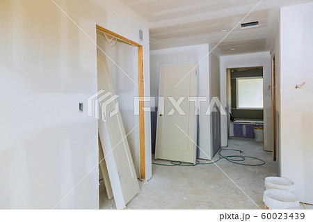 New home installing material for repairs in an apartment is under construction, remodeling, rebuilding and renovation door New home installing material for repairs in an apartment is under construction, remodeling, rebuilding and renovation door 60023439